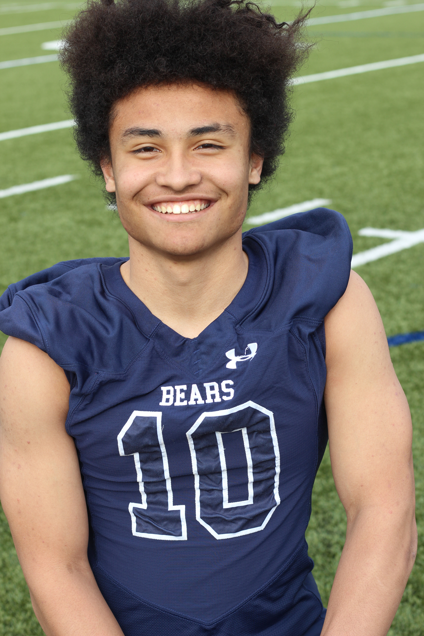 Two Sport Stars Football players standing out on the hardwood Prep