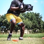 The U-Haul Crew: Offensive Lineman Moving The Line of Scrimmage