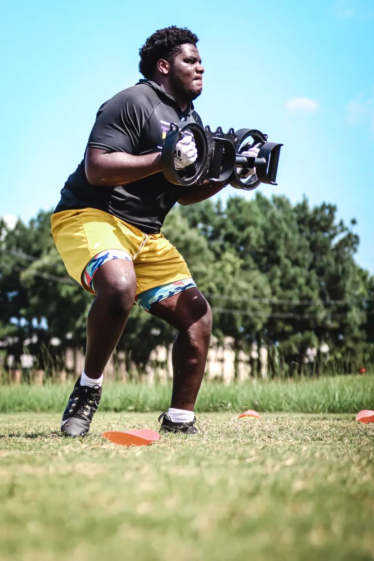 The U-Haul Crew: Offensive Lineman Moving The Line of Scrimmage